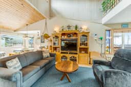 Spacious family home with ocean view balcony deck and fireplace dogs OK