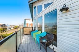 Bright home with stunning ocean views private hot tub and nearby beach access