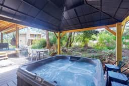 Friendly Home with Private Hot Tub High Speed WiFi and Wood Burning Fireplace - Image 2