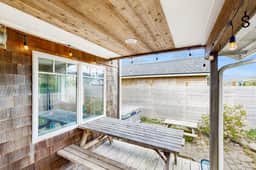 Dog friendly beach home with firepit private hot tub beach access and arcade
