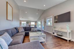 Newly built home with lake view and game room steps to downtown walk to beach