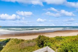 Bella Beach home with ocean view gas fireplace beach access and private hot tub
