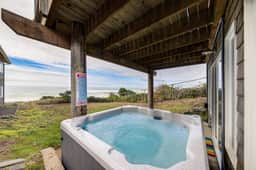Bella Beach home with ocean view gas fireplace beach access and private hot tub - Image 2