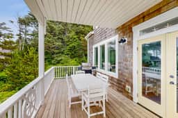 Ocean view home with hot tub game room furnished deck and fireplaces