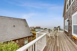 Ocean view home with hot tub game room furnished deck and fireplaces
