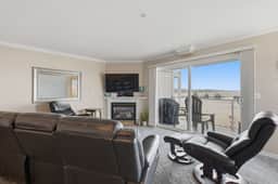 Waterfront Corner Condo with Fireplace and Ocean Views Close to Beach and Bay