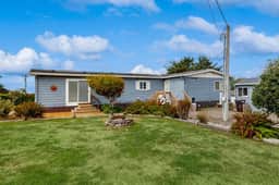 Classic home with partial ocean views and horseshoe pit close to beach