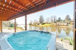 Charming Lakefront Home with Private Hot Tub and High Speed WiFi
