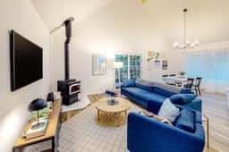 Renovated three story home by the beach with a furnished deck and washer dryer