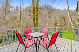 Dog friendly waterfront home on the Wilson River with great views deck and WiFi