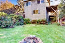 Dog Friendly Coastal Retreat with Water Views Deck Private Hot Tub and WiFi