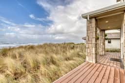 Beachfront home with amazing ocean views entertainment space and balcony
