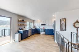 Bayview home with a deck overlooking the locally famous Ghost Hole fishing spot