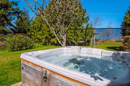 Delightful dog friendly home with bay views private hot tub and sauna