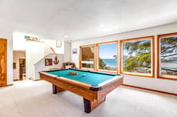 Limited Time Deals Coastal Hideaway with Ocean Views and Spacious Deck - Image 5