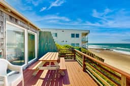 Ocean front home with spacious deck and beach access near shops and restaurants - Image 2
