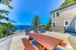 Quaint ocean view escape with modern interior smart TV and gorgeous deck - Image 3