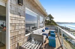 Remodeled home with multiple decks and ocean views short walk to beach - Image 4