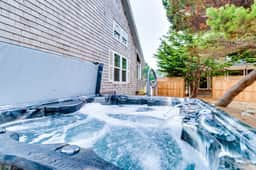 Sunny Beach House with Private Hot Tub Firepit and Tons of Space Dogs OK - Image 2