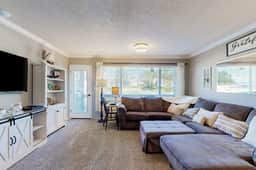 Creekfront Condo with Private Patio Beach Access Shared with D Gas Grill and Views - Image 3