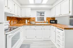 Ocean view home with pool table and fast WiFi steps to beach shops and eateries - Image 2