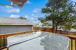 Family friendly home with private hot tub fireplace and BBQ close to beach - Image 3