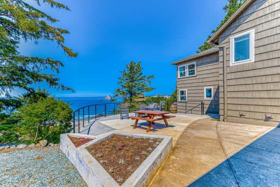 Quaint ocean view escape with modern interior smart TV and gorgeous deck - Image 1