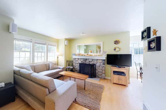 Dog friendly beach house with private hot tub free WiFi game room and ocean views - Image 1