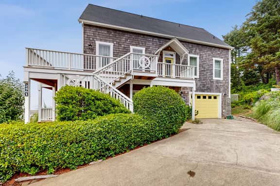 Ocean view home with hot tub game room furnished deck and fireplaces - Image 1