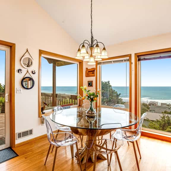 Limited Time Deals Coastal Hideaway with Ocean Views and Spacious Deck - Image 1