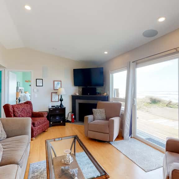 Beachfront home with ocean facing deck and ocean views throughout modern kitchen - Image 1