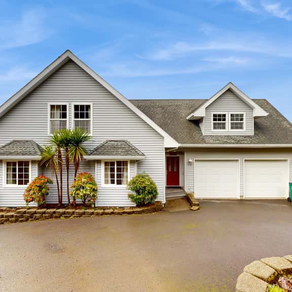 Spacious family home near the beach with ocean view large deck free WiFi and more - Image 1