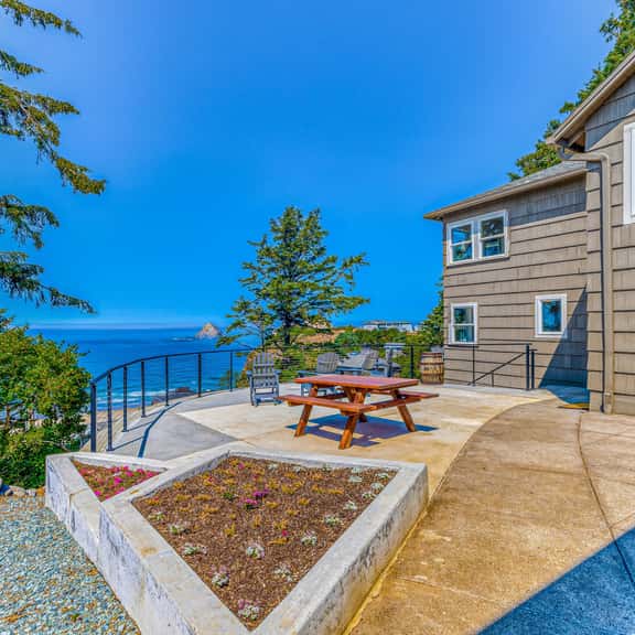 Quaint ocean view escape with modern interior smart TV and gorgeous deck - Image 1