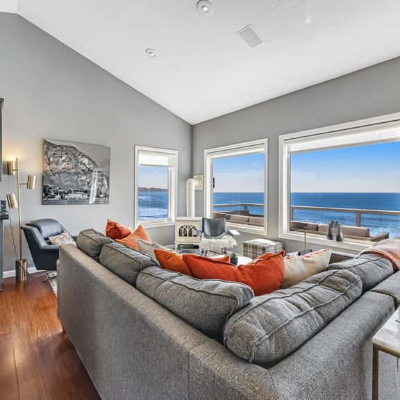 Remodeled home with multiple decks and ocean views short walk to beach - Image 1