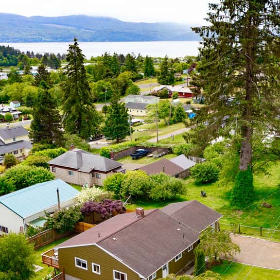 Water view retreat with scenic deck grill yard fireplace board games and with D - Image 1