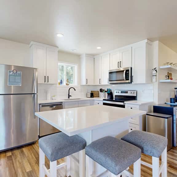 Modern Beach Cottage with a covered patio fire pit grill and easy beach access - Image 1