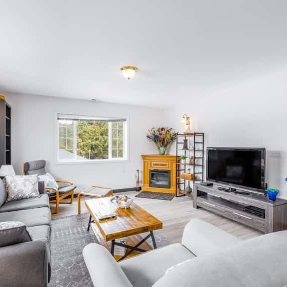 Inviting Haven with Large Yard WiFi and Partial Ocean View Steps to Beach - Image 1