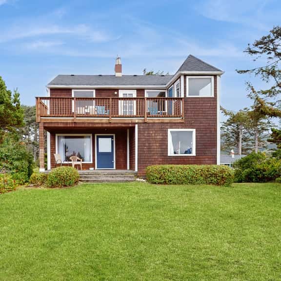 McKinnon's beach house oceanfront with beach views deck patio and fireplace dog friendly - Image 1