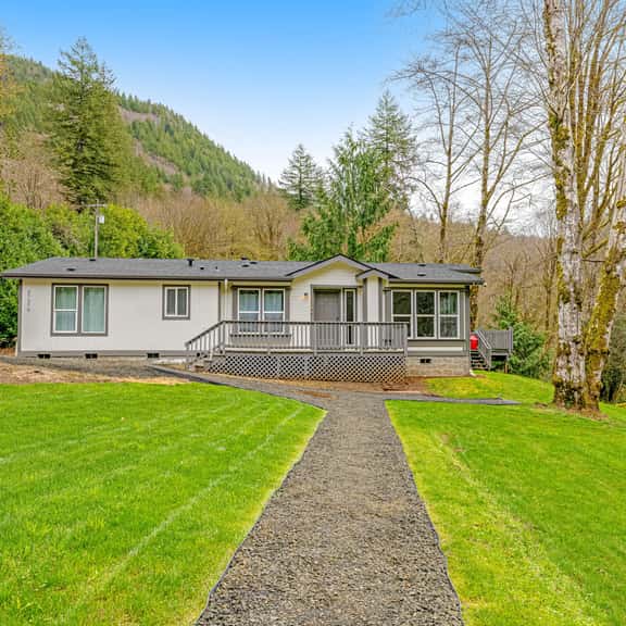 Dog friendly waterfront home on the Wilson River with great views deck and WiFi - Image 1
