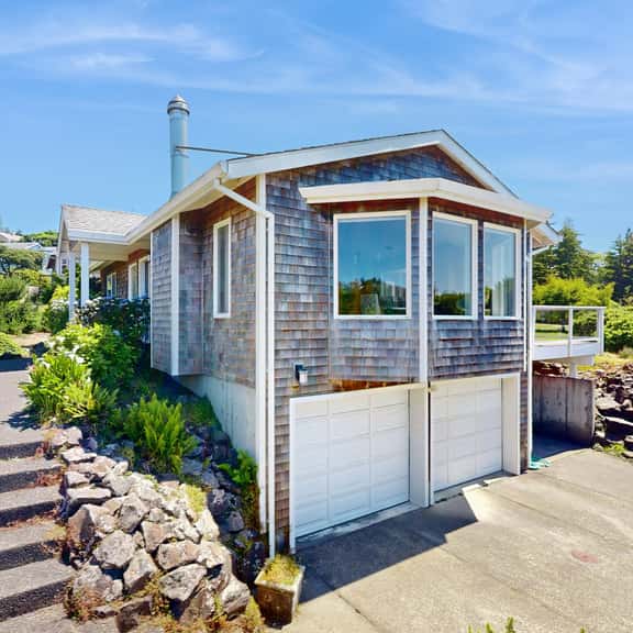 Stunning coastal home with ocean views firepit and media room walk to beach - Image 1