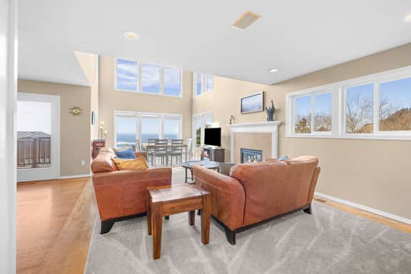 Sunlit home with gorgeous ocean views big decks and hot tub
