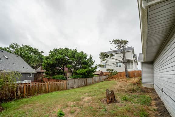 Cozy dog friendly getaway one block from beach with fireplace and gas grill