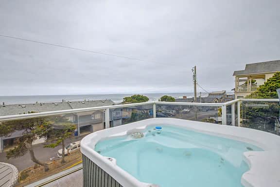 Luxury home with hot tub overlooking the beach and game room - Image 2