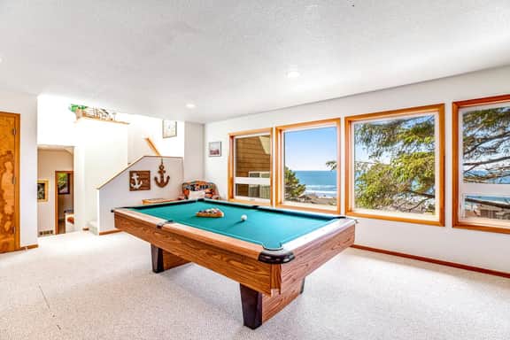 Limited Time Deals Coastal Hideaway with Ocean Views and Spacious Deck