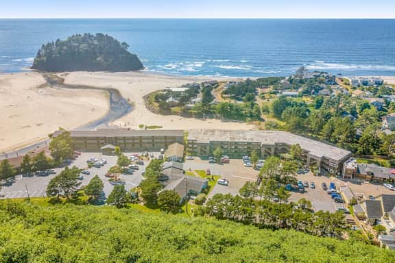 Cozy Coastal Condo Steps from the Beach with Deck Views