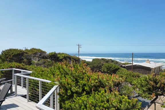 Renovated lake ocean view retreat with hot tub outdoor living and fireplace