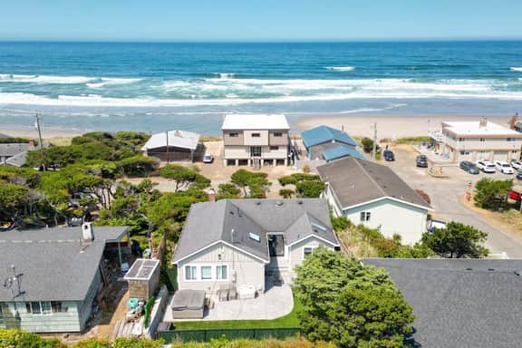 Renovated lake ocean view retreat with hot tub outdoor living and fireplace - Image 5