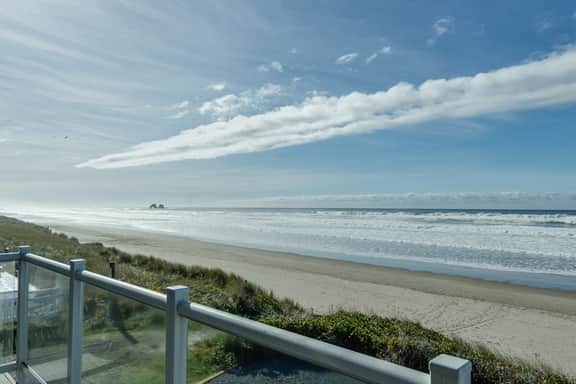 Oceanfront home with a washer dryer and beach access