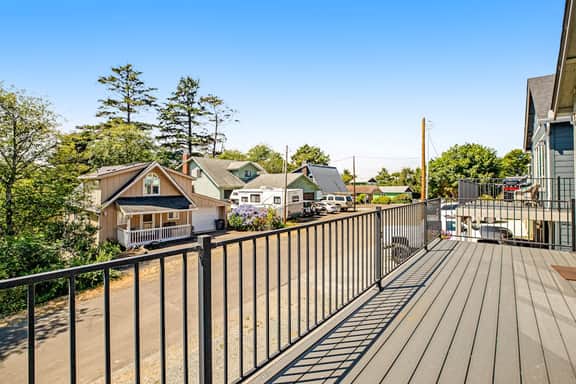 Coastal getaway with deck beach gear and washer dryer walk to beach