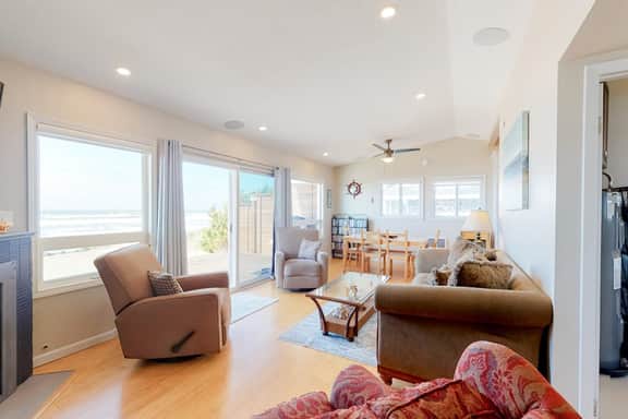 Beachfront home with ocean facing deck and ocean views throughout modern kitchen